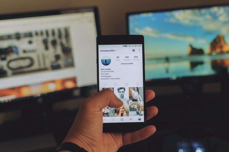 Reviewing a business social media profile on a phone
