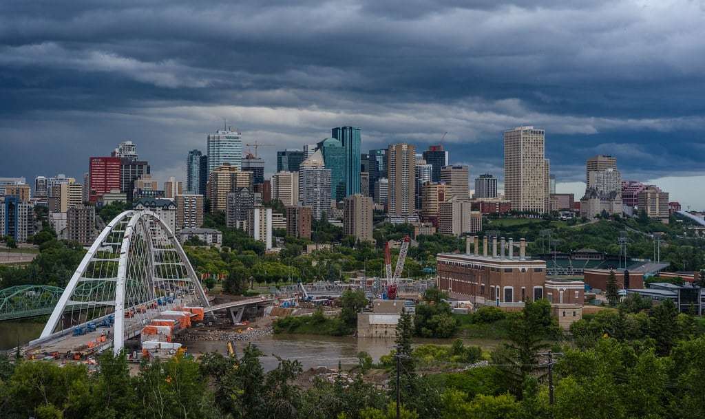Downtown Edmonton skyline above the North Saskatchewan River valley and Walterdale Bridge